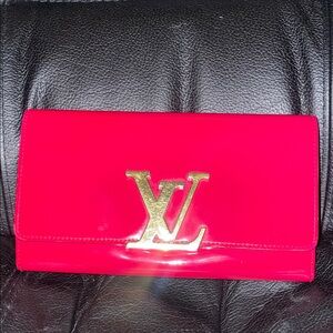 Louis Vuitton Fuchsia Clutch with Gold Logo Full Inclusion